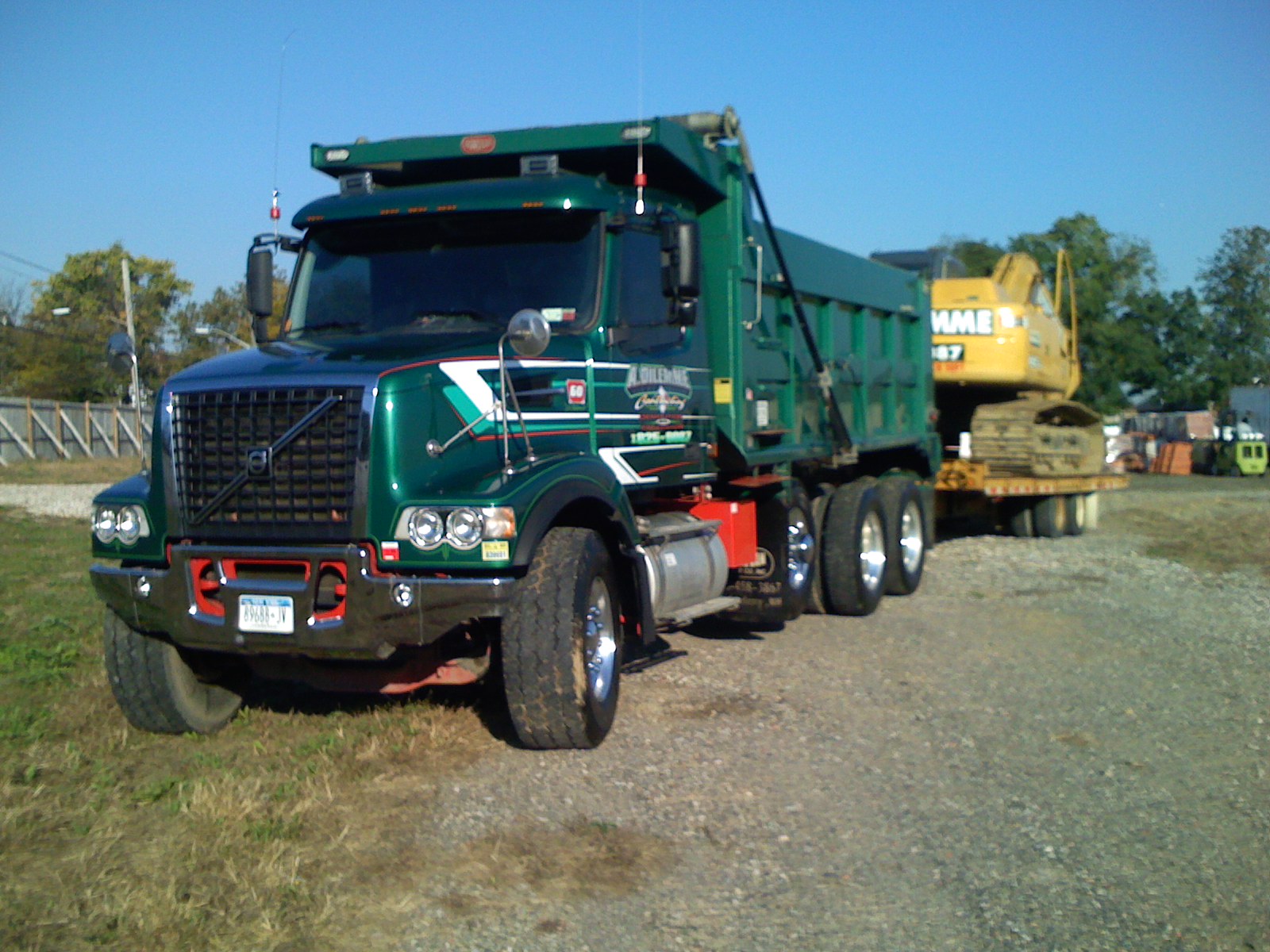 Heavy dump trucks hauling material